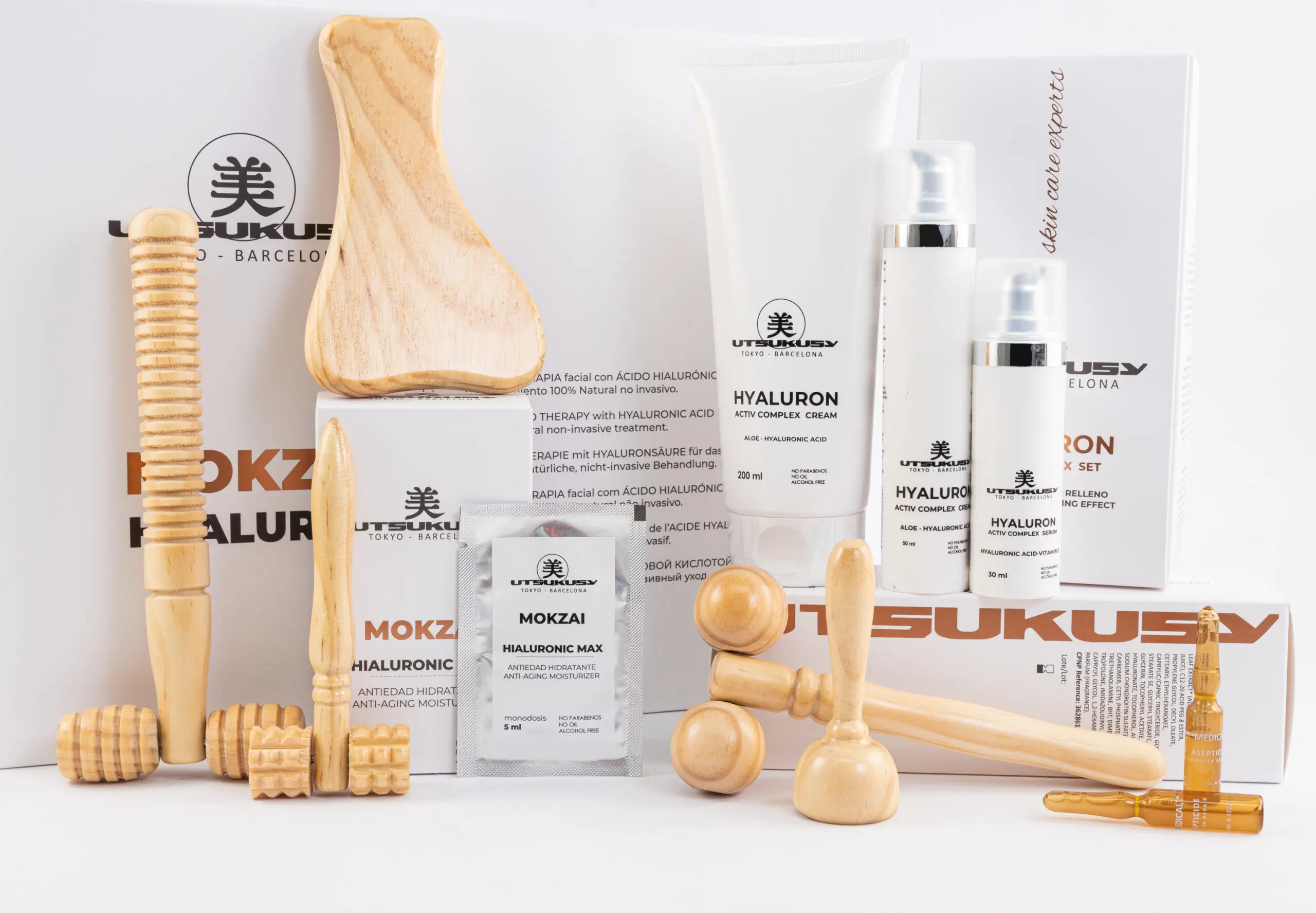 Productos profesionales de Utsukusy para cabina: cremas, sérums y accesorios de masaje facial